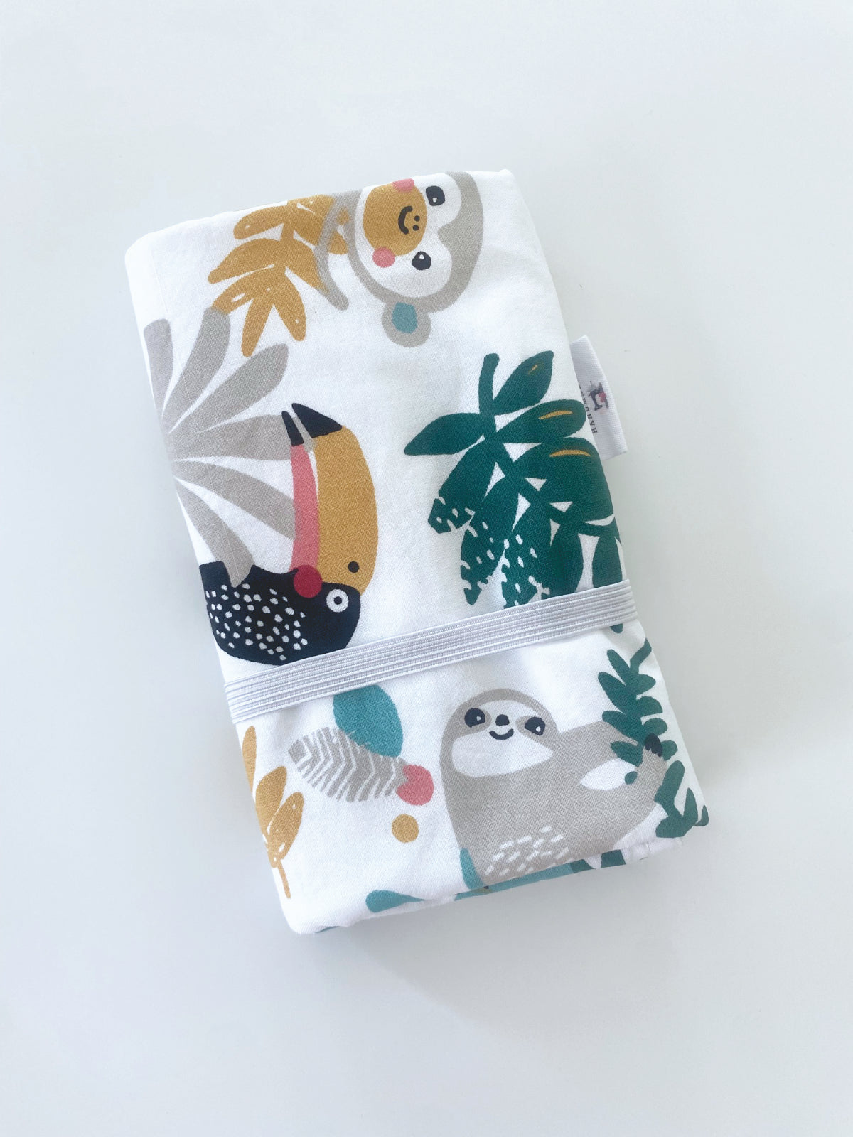 Waterproof changing mat in tropical pattern