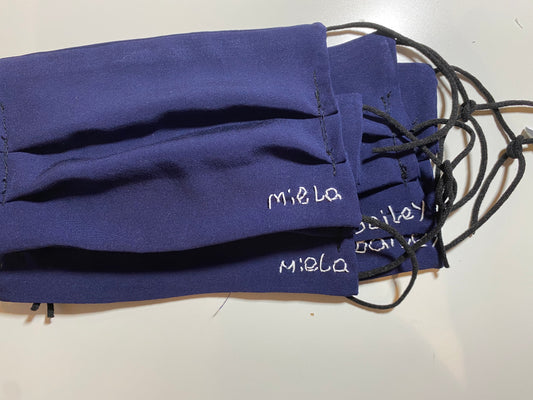 Hand stitched personalization for masks