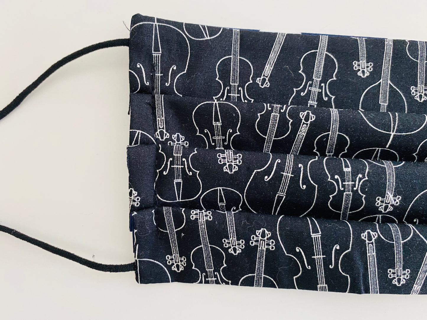 Musical theme re- usable adjustable face cover